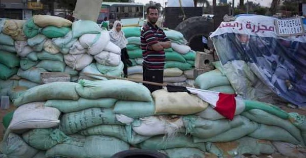 Mohammed Morsi supporters fortify sit-in sites