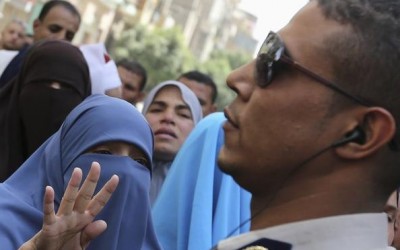 Egypt court signals death penalty for 12 accused of killing policeman