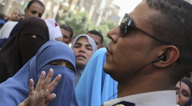 Egypt court signals death penalty for 12 accused of killing policeman