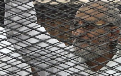 Brotherhood top leader Badie referred to court over new trial